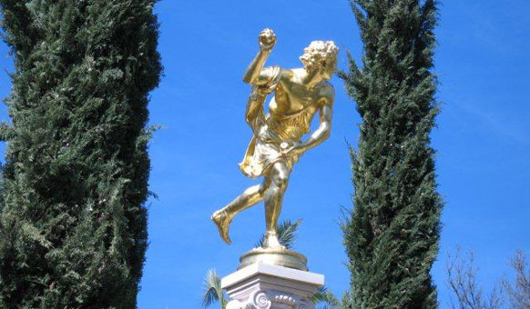 Gold-statue,-cypresses.jpg